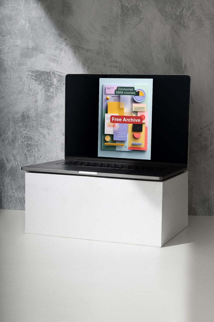 Laptop on a white stand with a gray concrete wall background
